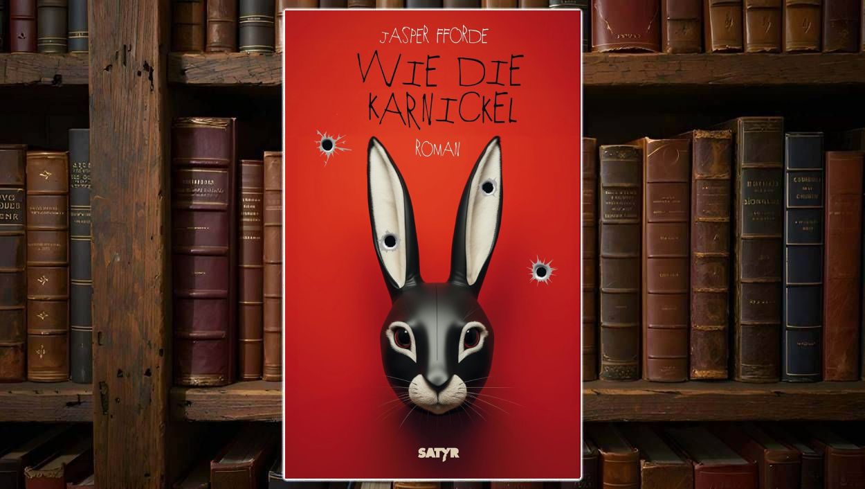 Cover von Jasper Ffordes Roman „Wie die Karnickel“: Schwarzer Kaninchenkopf mit großen weißen Ohren vor rotem Hintergrund, mehrere Einschusslöcher durchziehen das Bild – symbolisch für die bissige Gesellschaftssatire.