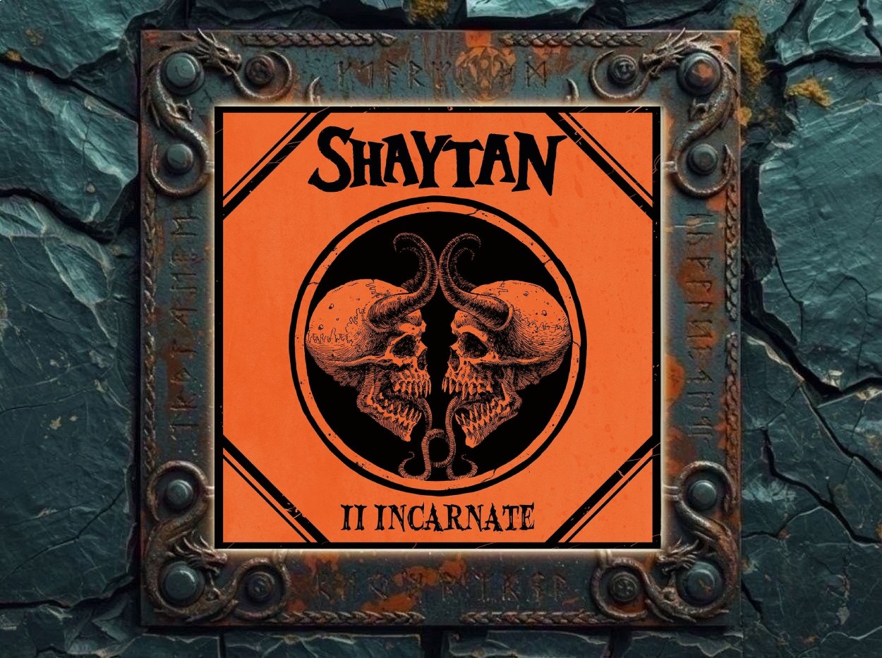 Albumcover von Shaytan – II Incarnate: Orange-schwarzes Doom-Metal-Cover mit zwei gespiegelten gehörnten Totenschädeln in einem schwarzen Kreis, darüber das Bandlogo Shaytan, darunter der Albumtitel II Incarnate.