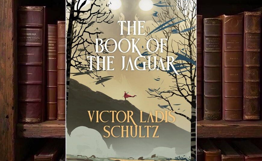 Cover von Victor Ladis Schultz’ The Book of the Jaguar mit einem riesigen schemenhaften Jaguargesicht und leuchtenden hellen Augen im Nebel über einer kleinen rot gekleideten Figur auf einem felsigen Pfad, eingerahmt von dunklen kahlen Bäumen.