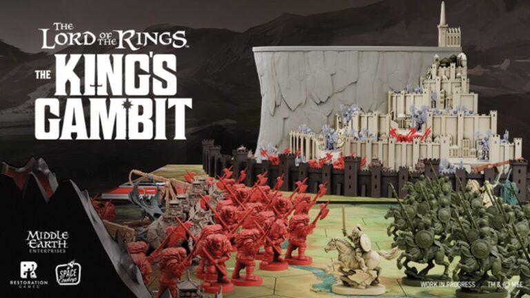Spielaufbau von The Lord of the Rings: The King’s Gambit mit dreidimensionalem Minas Tirith sowie großen roten und grünen Miniaturenarmeen.