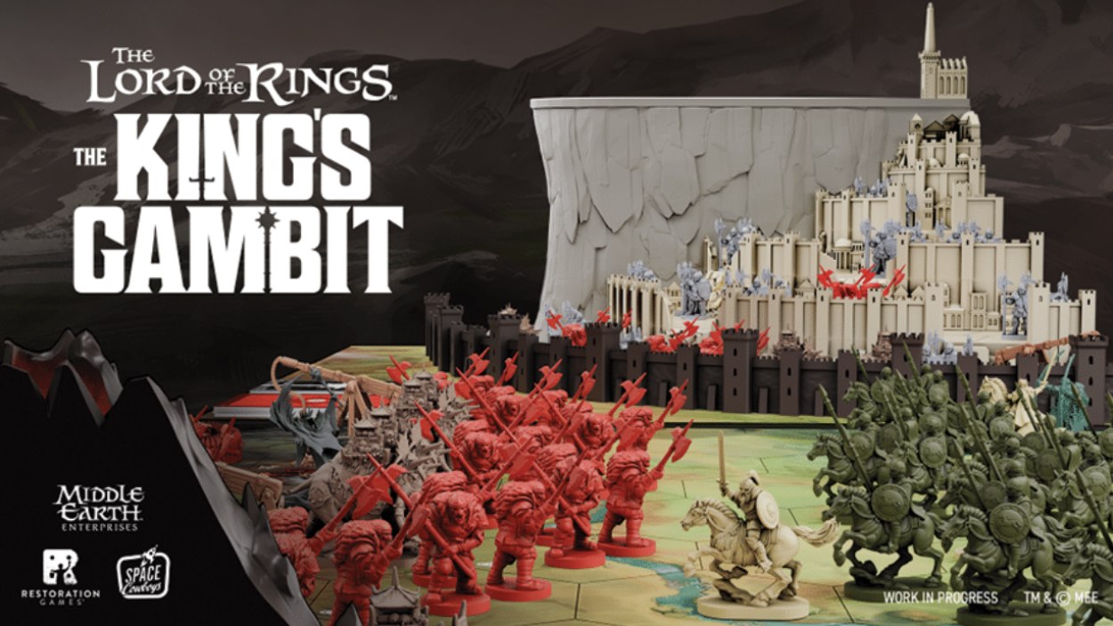 Spielaufbau von The Lord of the Rings: The King’s Gambit mit dreidimensionalem Minas Tirith sowie großen roten und grünen Miniaturenarmeen.