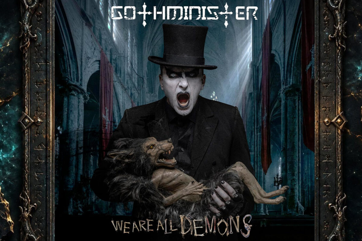 Cover von Gothminister – We Are All Demons: Ein weiß geschminkter Mann mit schwarzem Zylinder und aufgerissenem Mund steht in einer düsteren gotischen Kirche und hält ein wolfähnliches, dämonisches Wesen in den Armen. Über ihm steht der Bandname, darunter der Albumtitel.