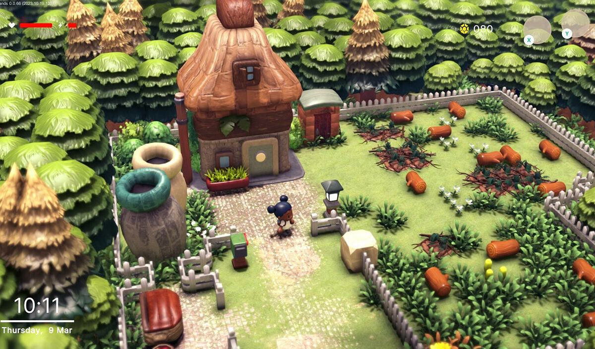Gameplay-Screenshot aus Littlelands mit einer kleinen Spielfigur vor einem märchenhaften Holzhaus mit geschwungenem Dach. Ein weißer Gartenzaun umgibt das Grundstück mit Blumen, Baumstämmen und Pflanzen. Ringsum wachsen dichte grüne Bäume.