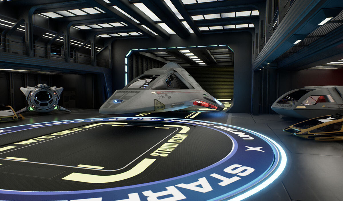 Screenshot aus dem Star Trek Voyager Game Project: Der Delta Flyer steht im detailreich nachgebauten Shuttlehangar der USS Voyager, umgeben von mehreren weiteren Shuttlefahrzeugen.